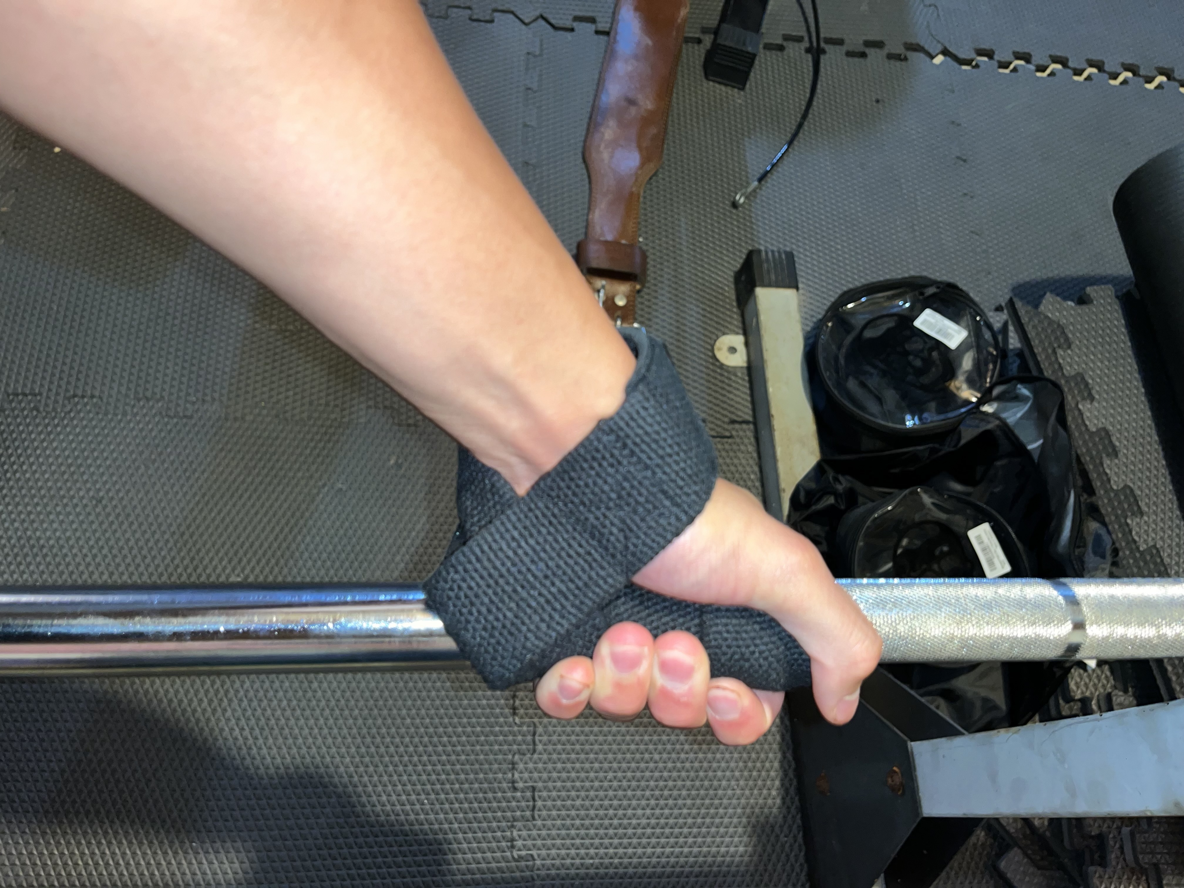 Wrist Straps or Lifting Hooks? What You Should Use to Help With Your Weak  Grip 